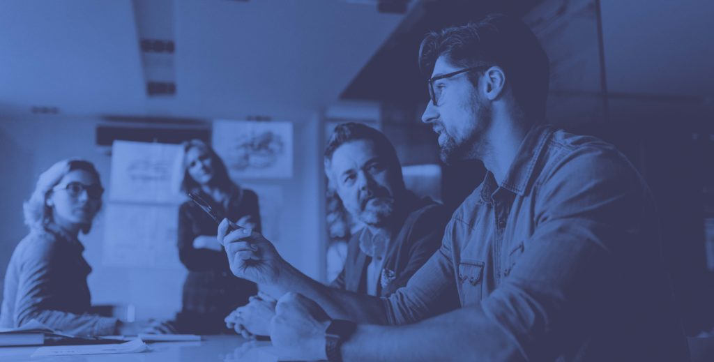Man Presenting in Meeting