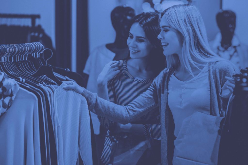 Girls shopping for clothes