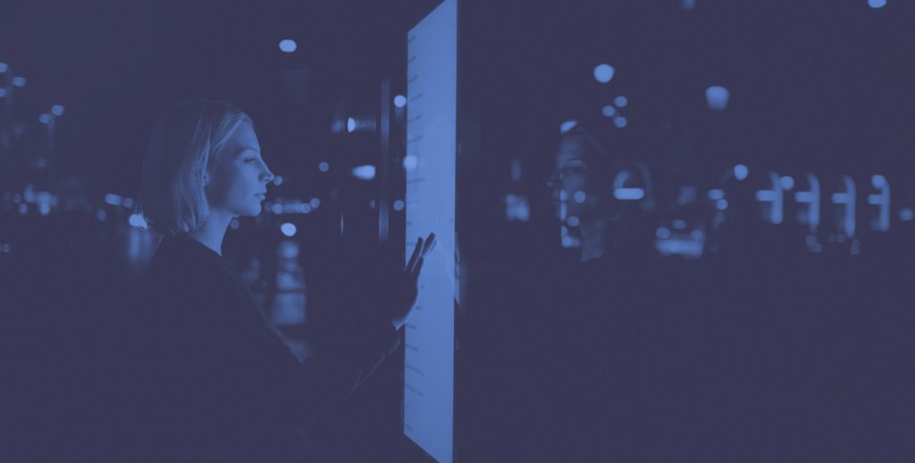 Girl interacting with digital billboard