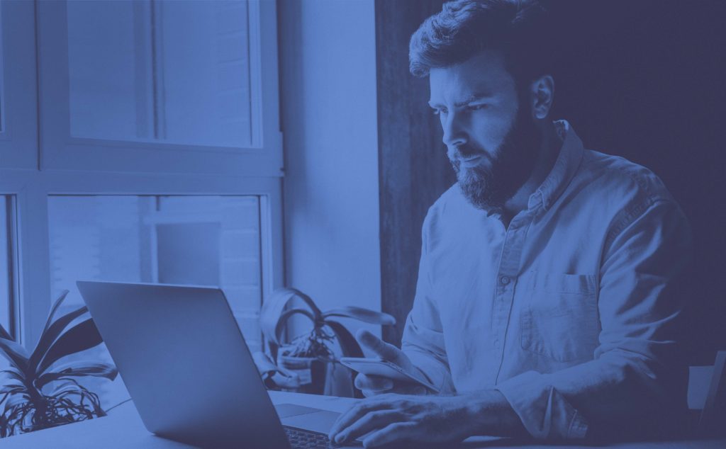 Man working seriously on computer