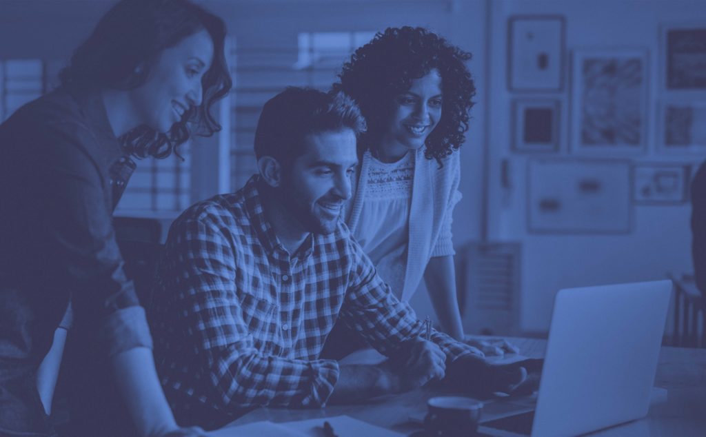 coworkers looking at computer
