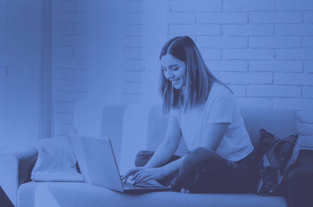 Woman at home on laptop