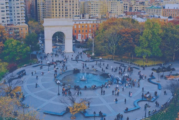 people milling around Washinton Square Park in NYC
